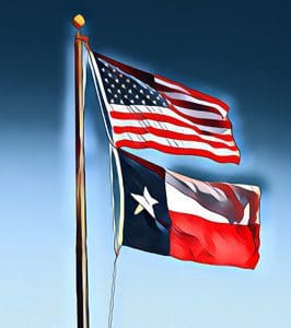 An American flag and a Texas state flag are flying on a pole against a clear blue sky.