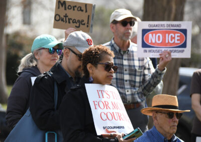 Dr. Sabrina E. Dent, director of the BJC Center for Faith, Justice and Reconciliation, holds a sign calling for moral courage during a Faithful Witness Wednesday event on the grounds of the U.S. Capitol.